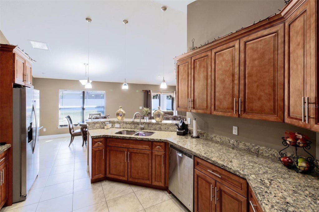 Photo of 1438 SW Devera Avenue, Port Saint Lucie, FL 34953 (MLS # O6452485)