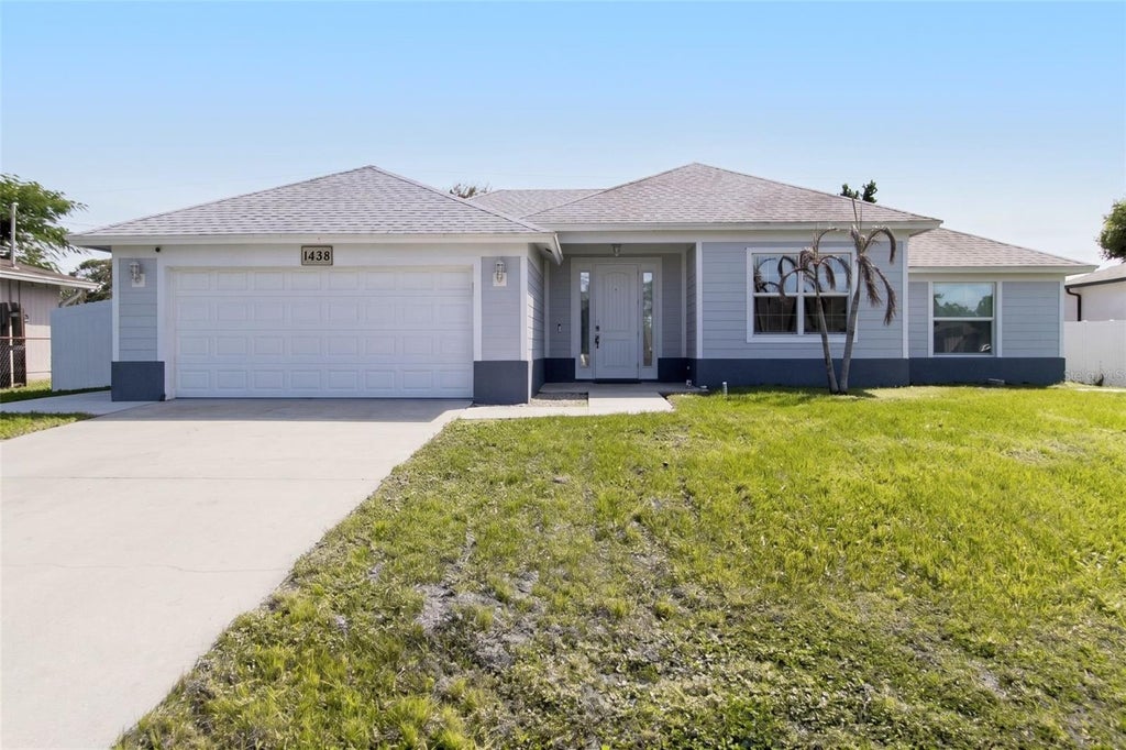 Photo of 1438 SW Devera Avenue, Port Saint Lucie, FL 34953 (MLS # O6452485)
