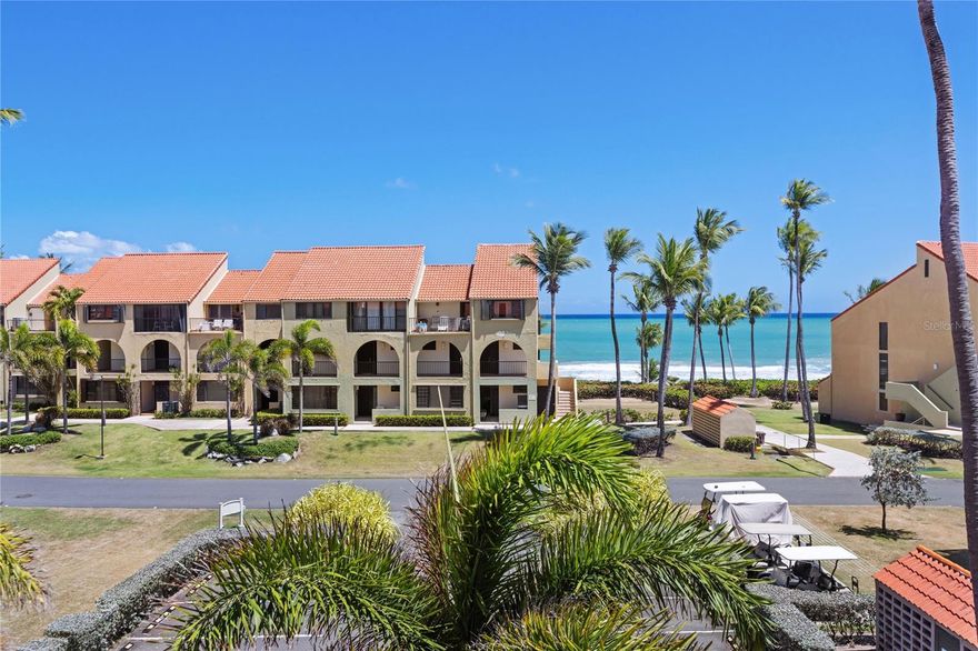 Beach Village 128 | Palmas del Mar, Puerto Rico
3 bedrooms | 2 bathrooms | 1,390 sq ft | $495,000
Wake up to sunrise over the ocean and wind down with sunset views across the golf course. Beach Village 128 offers a rare dual-view experience from both sides of the residence. This thoughtfully remodeled 3-bedroom, 2-bath condominium features two private balconies, one overlooking the golf course and the other with ocean views just across the street.
A standout feature of the home is the recently reconfigured and fully remodeled kitchen, designed to enhance both functionality and flow. It now includes a sizeable central island, expanded storage, and a layout well suited for everyday living and entertaining. The interior maintains a cohesive modern design with bright, open spaces and a primary bedroom with an en-suite bathroom that provides comfort and privacy.
The property includes a 6-kilowatt backup battery system for added peace of mind during power outages, along with assigned parking and membership to the Beach Village Pool Association. Its location places you just steps from the beach and within steps of the Wyndham Palmas Beach Resort.
Ownership provides access to all the amenities Palmas del Mar has to offer, including two championship golf courses, tennis and pickleball courts, an equestrian center, beach club, marina, restaurants, shops, and The Palmas Academy, a pr¡vate school serving pre-kindergarten through twelfth grade.
The monthly Beach Village regime fee is $419.95 and includes hazard insurance. The annual Palmas del Mar HOA fee is $1,300, and the Beach Village Pool Association membership is $625 per year.
Open views, a prime location, and well-executed upgrades make Beach Village 128 a strong option for full-time living, a vacation retreat, or income-producing use within Palmas del Mar.