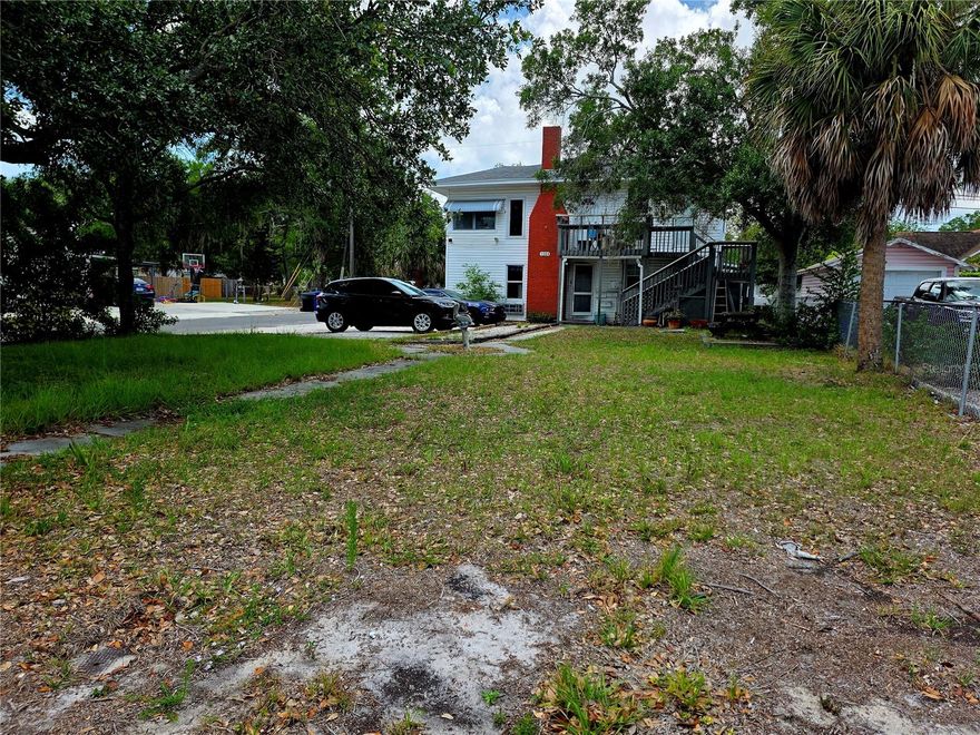 Investor opportunity in the heart of Northeast St. Petersburg! This triplex at 1204 38th Ave N offers strong income potential with a versatile layout and future upside. The standout feature is the spacious upstairs 2-bedroom unit boasting cathedral ceilings, creating an open, airy feel that’s highly desirable for tenants or owner-occupants alike.  Situated on a large lot, the property presents a rare opportunity for expansion—explore the potential to add additional units or enhance outdoor living spaces (buyer to verify zoning and development possibilities). Whether you’re looking to generate immediate rental income, live in one unit while renting the others, or maximize value through redevelopment, this property checks multiple boxes. Located in a high-demand area of St. Petersburg, close to downtown, shopping, dining, and major roadways, this is a prime addition to any real estate portfolio.