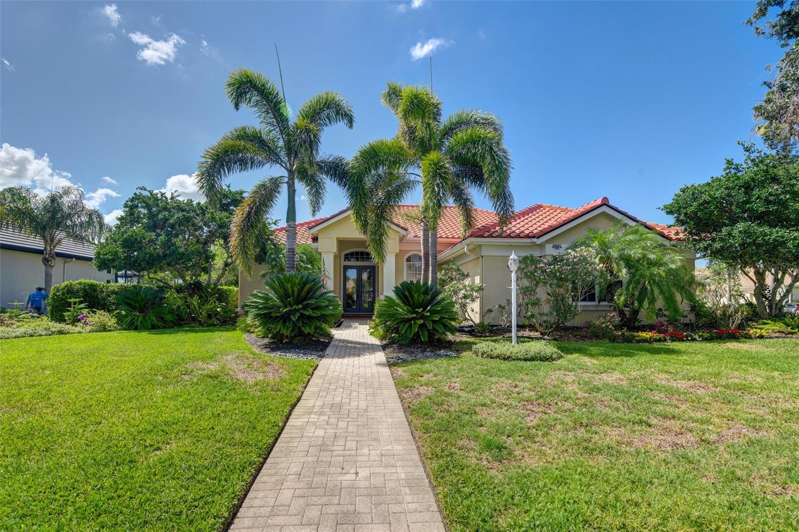 Discover luxury living within the Lakewood Ranch Country Club. This beautifully maintained three bedroom three bathroom home offers an unparalleled blend of elegance and comfort. The key features are open concept living area perfect for entertaining guest. The gourmet kitchen features granite countertops, built in oven, countertop gas stove, seating at kitchen island and kitchen desk. Luxury master suite with large walk in closet, tile floor and door to lanai. Master bath has double sinks with granite countertop, tub, walk in shower and make up station. Bonus feature is the versatile office/den or library, ideal for remote work, a personal study or a cozy reading retreat. Expansive windows showcasing breathtaking views for the beautiful lake preserve view. Enjoy relaxation and enjoyment in the outdoor living pool area with spa. Recent upgrades include new tile roof installed in 2023, new cooling and heating unit installed in 2022 for energy efficiency and comfort as well as attic enhancement in 2024 with new insulation and ductwork, improving climate control and energy savings.Optional membership to the Lakewood Ranch Country Club provides access to an exceptional Florida lifestyle, including two luxurious clubhouses, four golf courses, tennis courts, pickleball courts, fitness center, aquatic center, parks and recreational trails. Prime location conveniently near UTC Mall, fine dining restaurants, Lakewood Ranch Main Street, Waterside, Polo fields and the soon to be new location for Mote Marine Aquarium. Bonus you're a short drive from some of the world's top rated beaches Siesta Key, Lido Beach and Anna Marie Island.