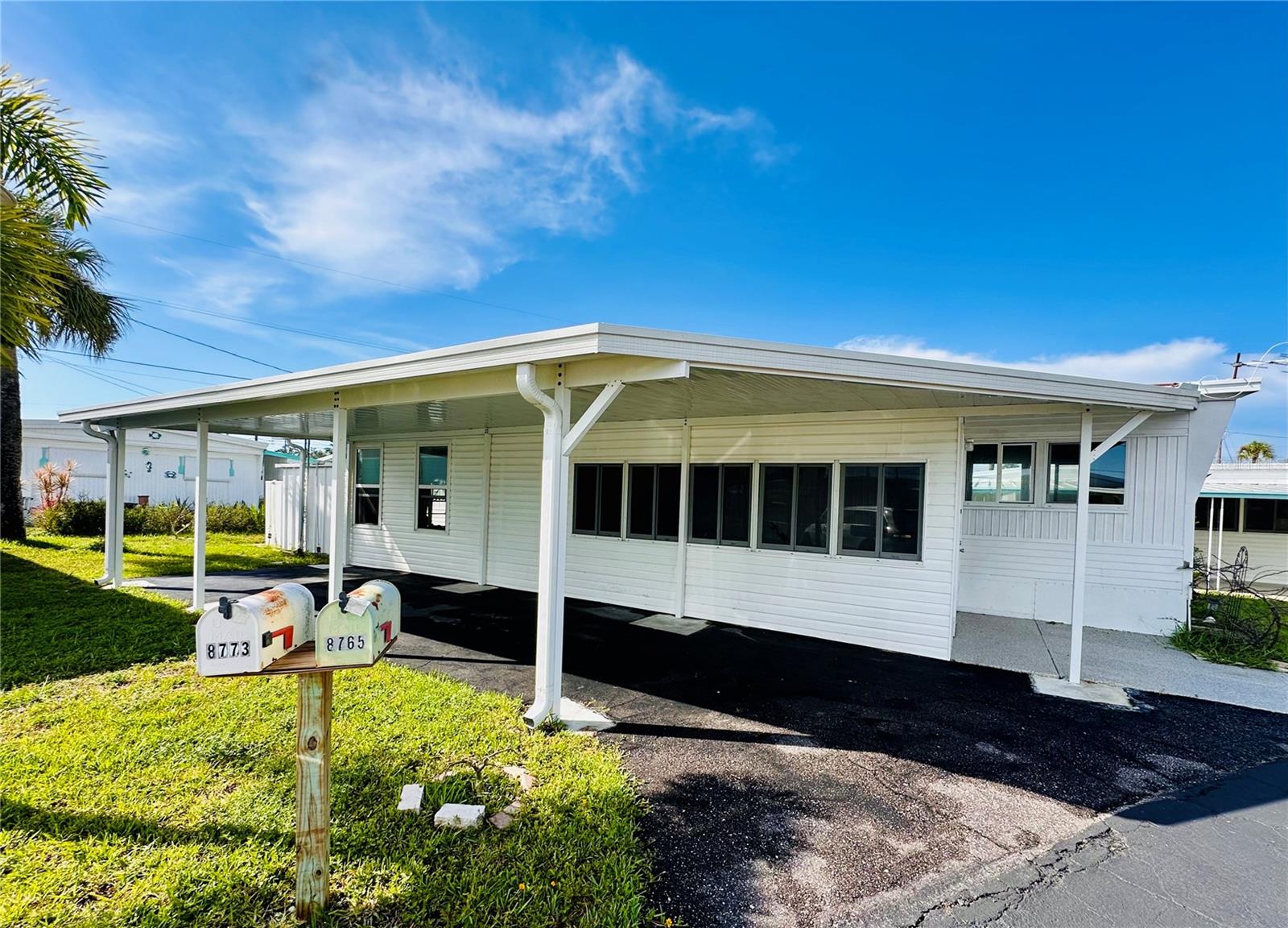 Situated in the Jungle Terrace neighborhood, Sea Horse Mobile Home is a 55+ resident owned community in St Petersburg. Don't miss out on one of the best investment opportunities in St Petersburg. This is one of the few communities where you actually own the land with much lower than average ($250) HOA fees. This property was also affected by recent flooding but has had the flooring and drywall removed. This is the perfect opportunity to renovate or build up. Home is priced way below the land value. Step outside to the back patio, where the allure of Florida living unfolds. Enjoy the sunshine as you grill in your creating lasting memories in your personal paradise. This home is part of a community that offers more than just a home—it provides a lifestyle. Within walking distance to the marina you can enjoy the convenience of no fixed bridges to the Gulf, making your maritime escapades effortlessly enjoyable. The community also boasts heated pool, ensuring year-round comfort. Nestled in a prime location, you're just moments away from our award-winning beaches. Less than a mile away is the St. Petersburg VA hospital. Walk to Target and the award-winning Doc Fords restaurant. Centrally located, the property is a mere 30 minutes from airports and a short 15-minute drive to downtown St. Petersburg, where the vibrant atmosphere and the new St. Petersburg pier beckon. Don't miss the opportunity to make yourself part of this vibrant community.