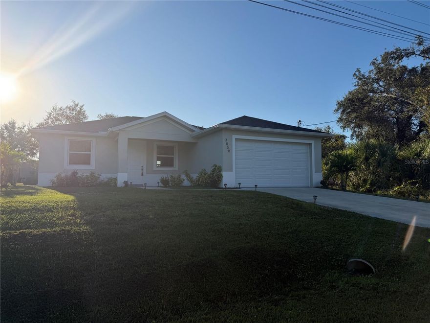 Start 2026 off in style by renting this immaculate, like-new 3-bedroom, 2-bath home, perfectly situated in North Port while remaining close to everything Port Charlotte has to offer.   This thoughtfully designed residence features durable laminate vinyl plank flooring throughout, sleek hard-surface countertops, stainless steel appliances, and a washer and dryer for added convenience. With just under 1,500 square feet of living space, the open living and dining area is enhanced by 10-foot ceilings and elegant Spanish lace wall finishes, creating a bright and inviting atmosphere.    The spacious primary suite boasts a walk-in closet and a spa-inspired bathroom complete with a glass-enclosed walk-in shower, separate soaking tub, and double vanity. Additional highlights include a two-car garage, a quiet low-traffic neighborhood, and a screened-in lanai with frosted panels for enhanced privacy—perfect for relaxing or entertaining.
This beautiful home offers the comfort and style of new construction and is ready for you to enjoy.