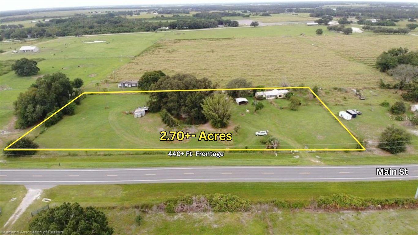 Under contract-accepting backup offers. Possibilities! Just under 3 Acres , excellent location in Wauchula, Hardee County, Florida. Beautiful, fenced land, with mature oak trees, 440+ road frontage. Although the structures are not habitable, there are several of them. 2 bedroom 1 bath house, 2 car detached garage, carport, fully enclosed shipping container storage with A/C, older mobile homes, campers, etc. Hardee County A-1 Zoning includes several permitted uses, (P) and other uses permitted with conditions (PWC), and special exception (S). Buyer should perform their Due Diligence when determining specific desired use. Some of these permitted uses and some potentially approved uses include, but not limited to: Single family dwelling, Citrus grove, Ranching, Pasturing, Sod farm, Birds/Fish/Rabbits, Agricultural related equipment sales/rentals, Agricultural related auction house, Dairy, Equestrian facility, private stables, Nursery, and more. Peaceful, rural, only a few minutes to downtown Wauchula, short drive to Bartow, Lakeland, Arcadia, Avon Park, etc. 70 miles from Tampa Fl, 60 miles to Gulf Beaches, 85 miles to Orlando. Neighboring counties- Highlands, DeSoto, Polk. Don't miss this opportunity!