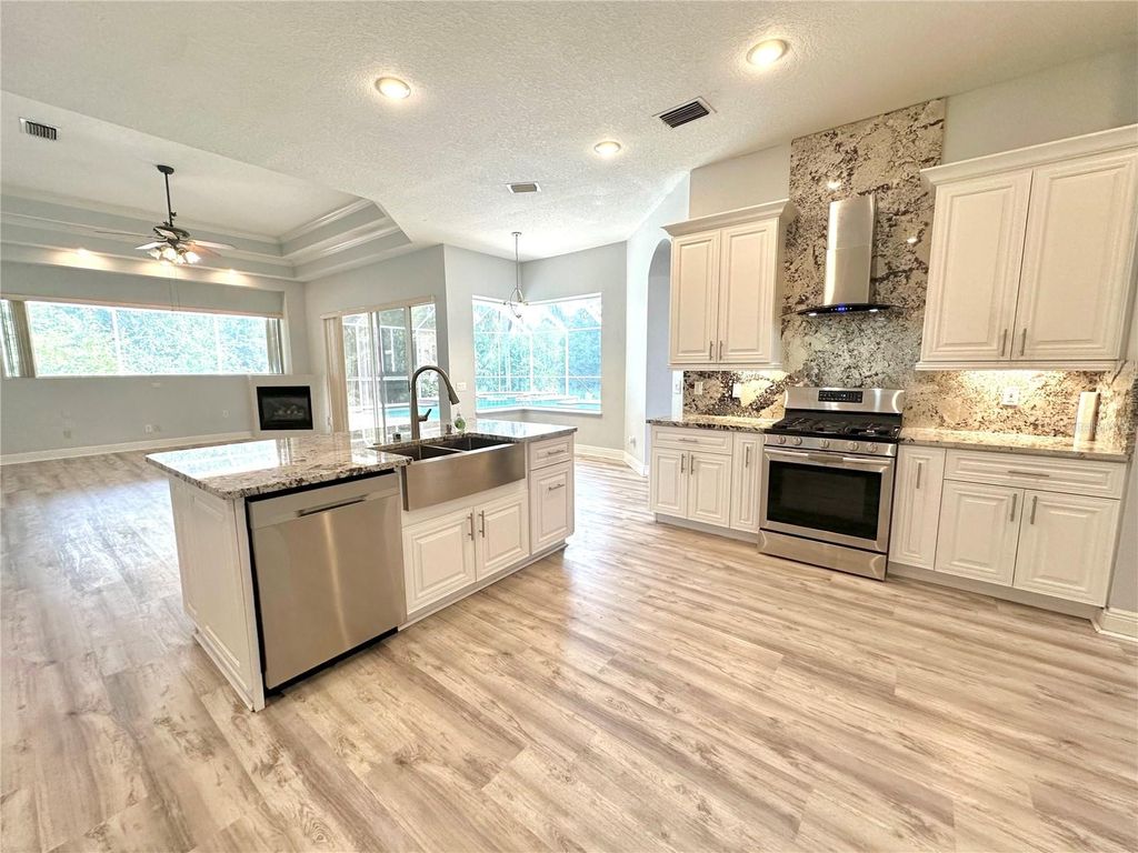 Photo of 10411 Riverburn Drive, Tampa, FL 33647 (MLS # TB8312624)