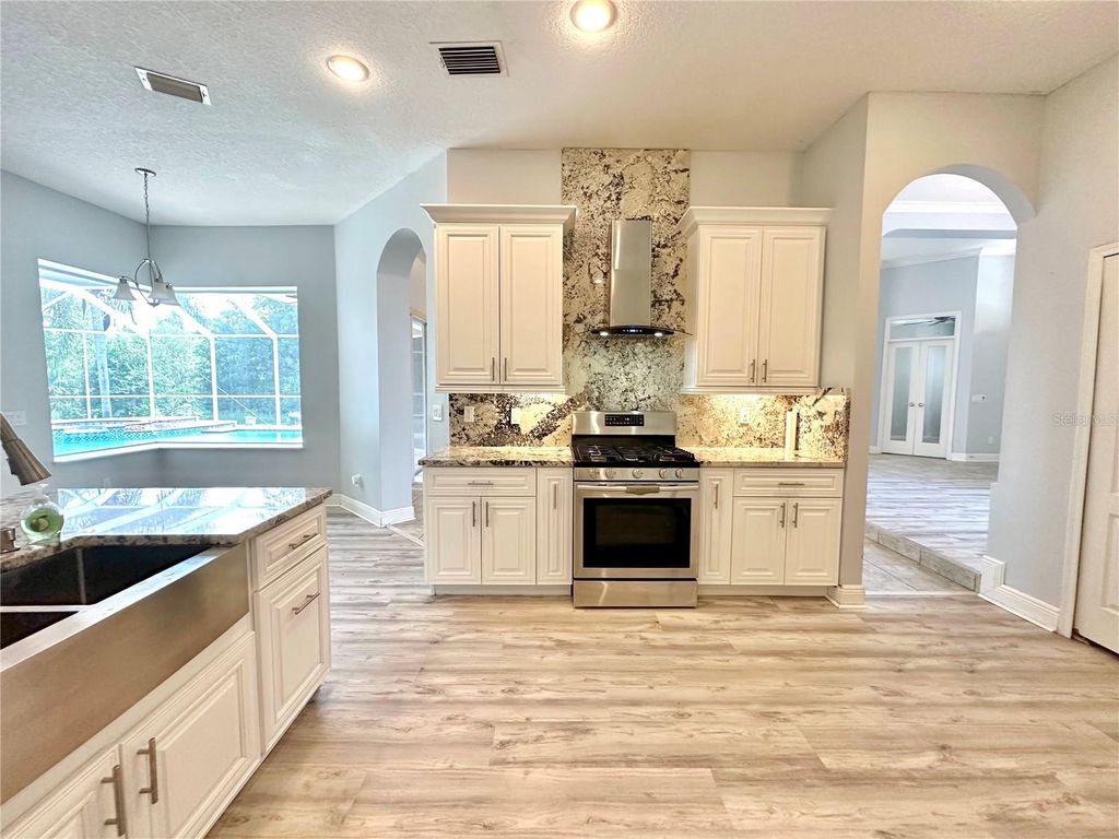 Photo of 10411 Riverburn Drive, Tampa, FL 33647 (MLS # TB8312624)