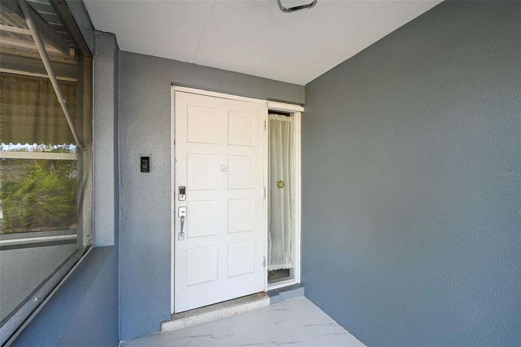 Photo of 1678 Country Club Parkway, Lehigh Acres, FL 33936 (MLS # C7524037)