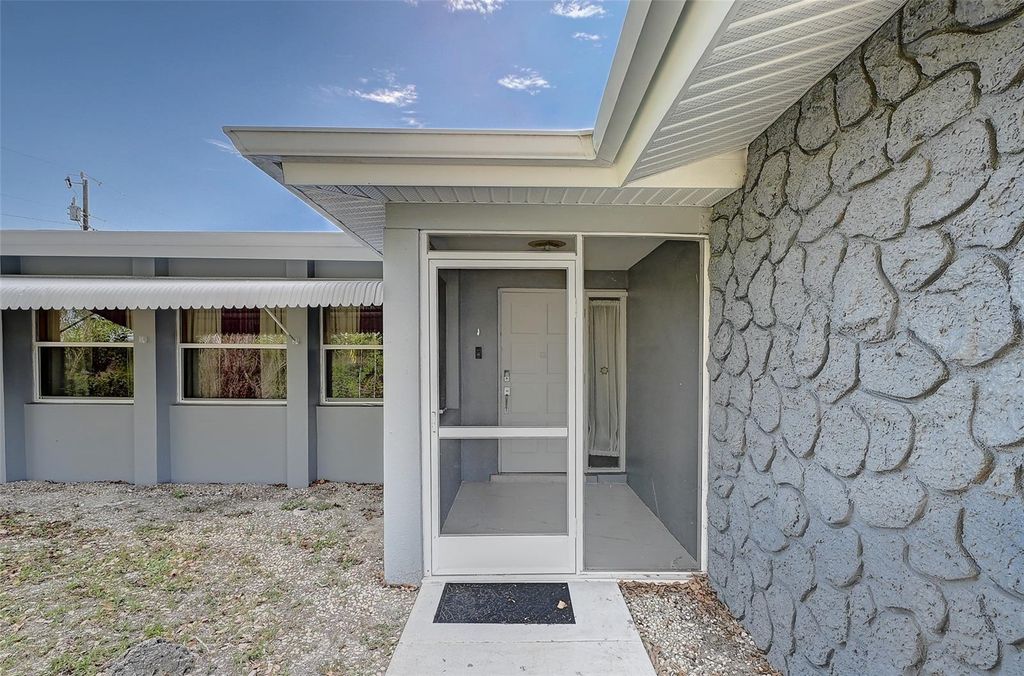 Photo of 1678 Country Club Parkway, Lehigh Acres, FL 33936 (MLS # C7524037)