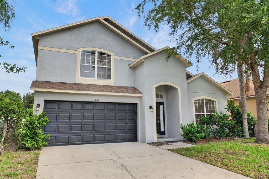 Photo of 1851 Great Falls Way, Orlando, FL 32824 (MLS # O6429396)
