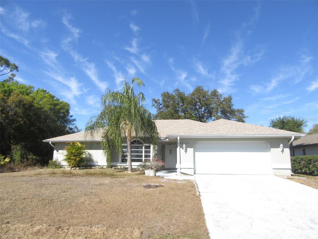 Photo of 23252 Mcqueeney Avenue, Port Charlotte, FL 33980 (MLS # C7521568)