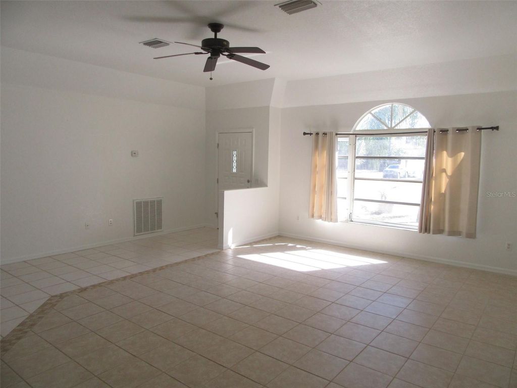 Photo of 23252 Mcqueeney Avenue, Port Charlotte, FL 33980 (MLS # C7521568)