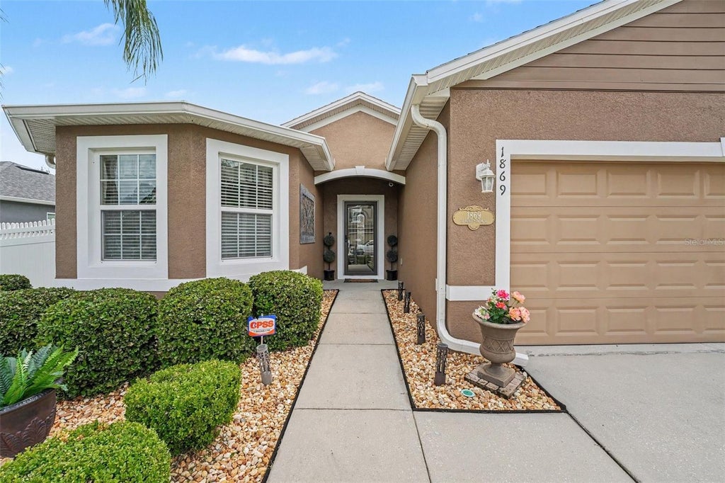 Photo of 1869 Monte Cristo Lane, Kissimmee, FL 34758 (MLS # O6427725)