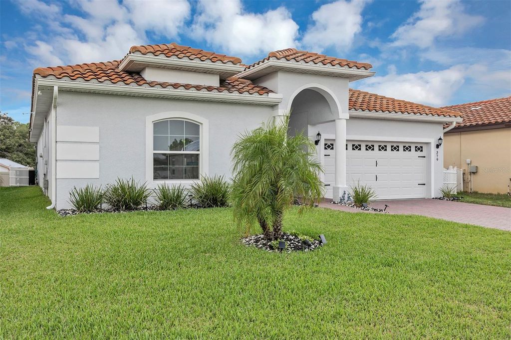 Photo of 379 Villa Sorrento Circle, Haines City, FL 33844 (MLS # O6348075)