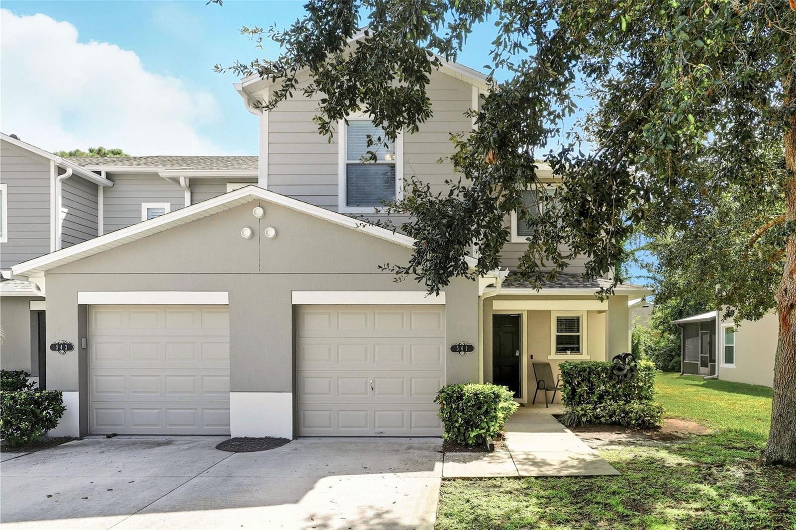 Welcome to this light and bright beautiful 3 bedroom, 2.5 bath end-unit townhome, perfectly designed for comfort and convenience. From the moment you walk up to the covered front patio, you’re greeted by natural sunlight and stylish touches throughout.
The first floor features an inviting foyer entry, laminate flooring throughout, and a convenient half bath for guests. The kitchen is a chef’s delight with newer stainless steel appliances (DISHWASHER, STOVE, and MICROWAVE 2025), granite countertops, 42” cabinets, a closet pantry, and a breakfast bar. The open-concept dining and family room offers plenty of space for entertaining, while an under-stair storage area provides extra storage, and there is direct garage access which adds to the function and convenience of this townhome. Step outside the sliding doors to a private patio backing up to trees and nature providing for a peaceful and serene setting. Upstairs, you’ll find the laundry closet, two spacious secondary bedrooms, and the primary suite with a walk-in closet and ensuite bath featuring granite countertops, dual sinks, and a linen closet. The secondary bath also offers dual sinks, granite counters, and additional storage with a hallway linen closet. Recent updates provide peace of mind: HVAC (2019), NEW SIDING (2025), ROOF (2025), and EXTERIOR PAINT (2025). The HOA keeps maintenance low while you enjoy community perks like the sparkling pool. All this plus a fantastic location—close to I-95, shopping, grocery stores, restaurants, and just minutes from the beach. Don’t miss out on this move-in ready gem—schedule your showing today and start living the coastal lifestyle you’ve been waiting for!
