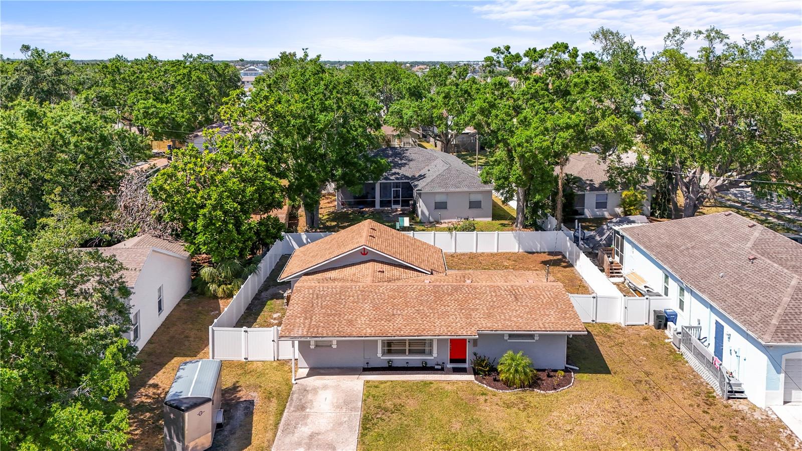 Now Offering $2000 Towards Buyer's Closing Cost or Rate Buy Down!
This updated Bradenton home sits high and dry with no history of flooding and comes with a transferable flood insurance policy for added peace of mind. Inside, you’ll find luxury vinyl plank flooring, a charming shiplap accent wall, and a split-bedroom layout ideal for privacy or flexible living.
The kitchen features granite countertops and a breakfast bar that flows into the open living area. Major updates include a new HVAC (2024), refreshed kitchen and baths, and upgraded electrical.
Enjoy a spacious laundry/storage room with outdoor access, plus a fully fenced backyard with a deck, perfect for relaxing or entertaining. With no HOA and the freedom to use as a primary home, vacation retreat, or investment, this property is packed with potential and located just minutes from Anna Maria Island and downtown Bradenton.