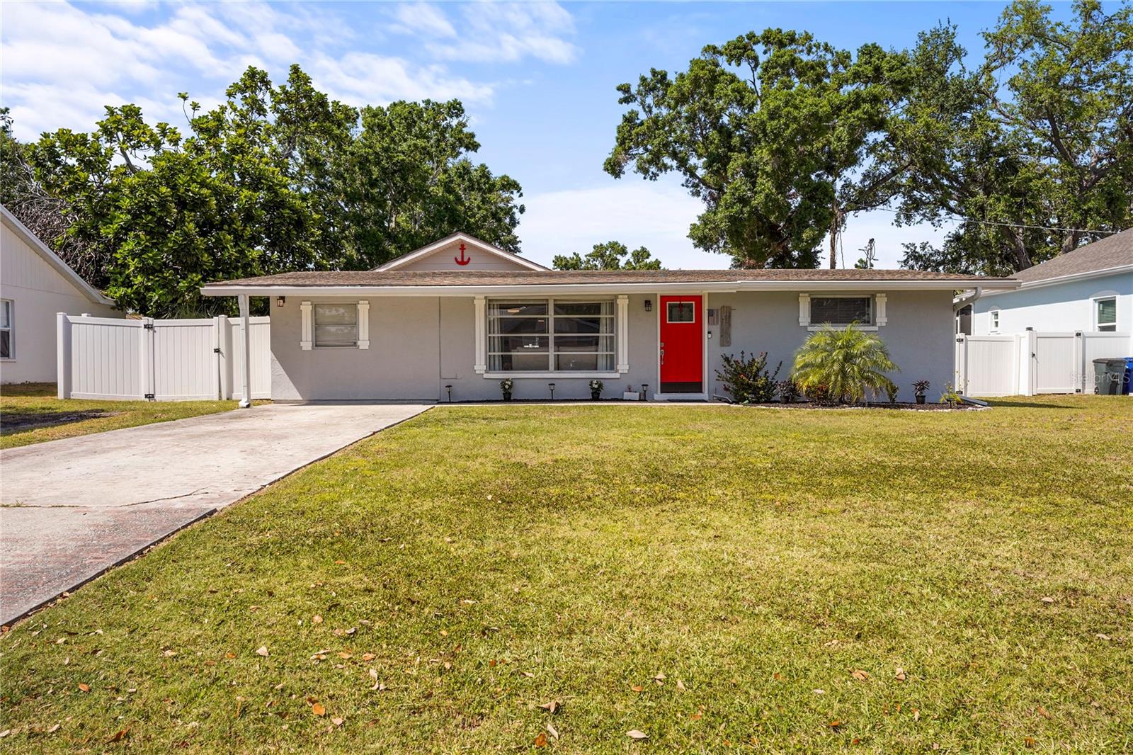 Now Offering $2000 Towards Buyer's Closing Cost or Rate Buy Down!
This updated Bradenton home sits high and dry with no history of flooding and comes with a transferable flood insurance policy for added peace of mind. Inside, you’ll find luxury vinyl plank flooring, a charming shiplap accent wall, and a split-bedroom layout ideal for privacy or flexible living.
The kitchen features granite countertops and a breakfast bar that flows into the open living area. Major updates include a new HVAC (2024), refreshed kitchen and baths, and upgraded electrical.
Enjoy a spacious laundry/storage room with outdoor access, plus a fully fenced backyard with a deck, perfect for relaxing or entertaining. With no HOA and the freedom to use as a primary home, vacation retreat, or investment, this property is packed with potential and located just minutes from Anna Maria Island and downtown Bradenton.