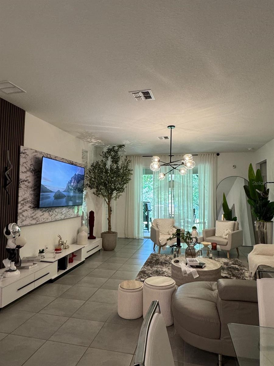 Photo of 4138 Babbling Brook Way, Kissimmee, FL 34746 (MLS # O6421659)