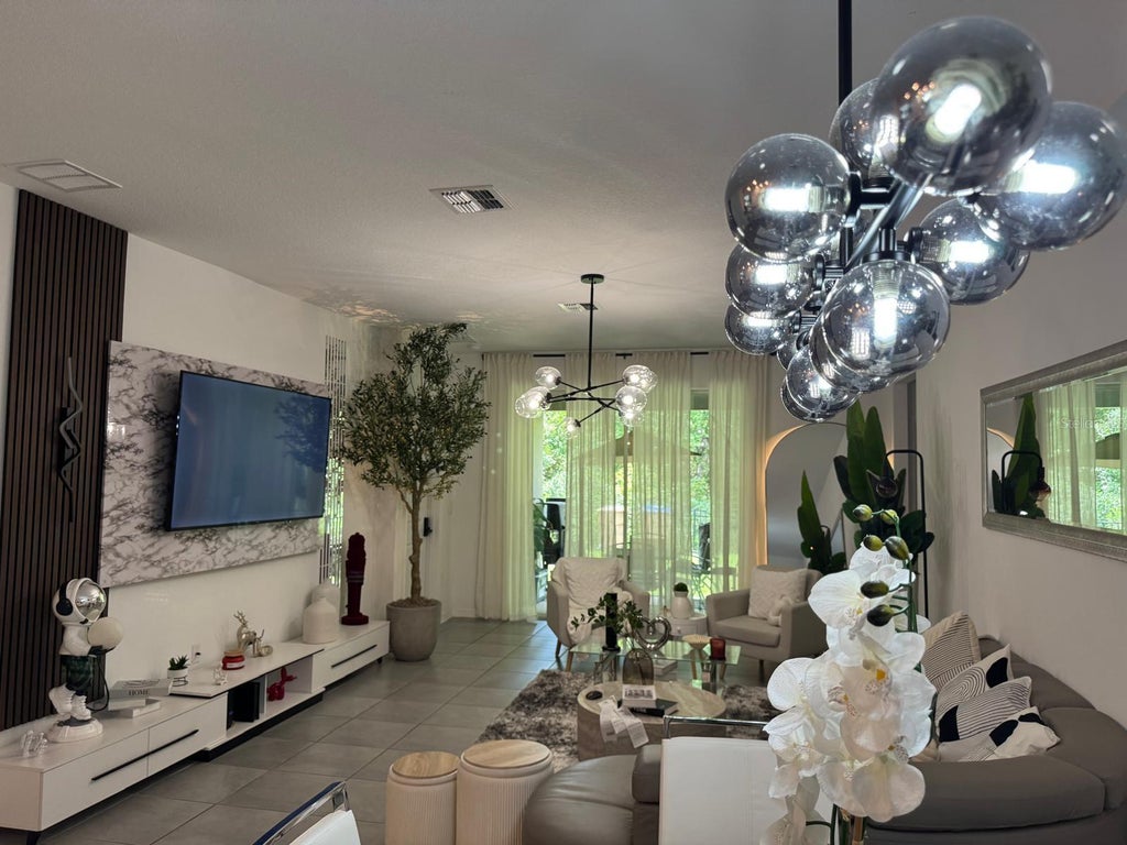 Photo of 4138 Babbling Brook Way, Kissimmee, FL 34746 (MLS # O6421659)