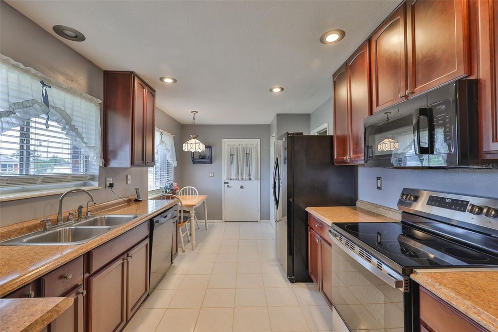 Photo of 643 Oakmont Avenue, Sun City Center, FL 33573 (MLS # TB8424953)