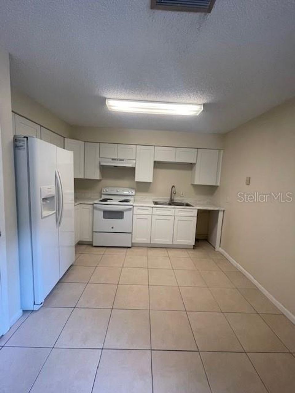 Photo of 333 W Alamo Drive, Lakeland, FL 33813 (MLS # TB8458808)