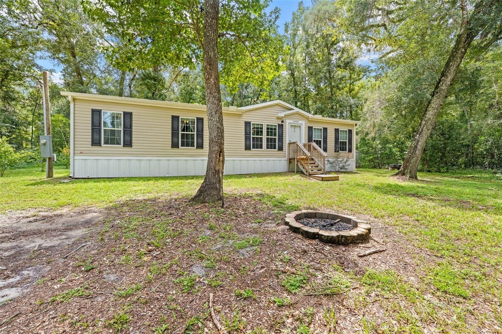 Photo of 24334 Audubon Drive, Brooksville, FL 34601 (MLS # TB8546182)