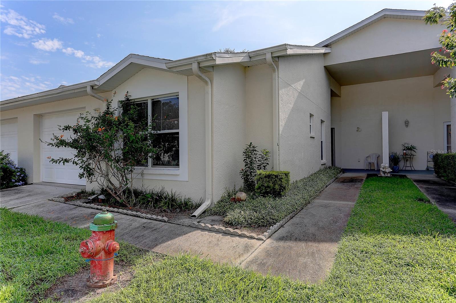This villa will be SOLD – don’t wait! Beautiful 3-bedroom, 2-bath, 1-car garage, single-story villa located in the desirable Meadowood Condominium community. This neighborhood is not age-restricted and welcomes families of all ages. You can even bring your favorite pet (1 per household) Offering 1,533 sq. ft. of living space, the home features high vaulted ceilings with a skylight, a split-bedroom floor plan, and a spacious 12’ x 17’ screened-in porch. In addition to the one-car garage and driveway parking, there is also an additional assigned parking space. The community provides multiple pools, tennis courts, a clubhouse, and walking trails. Inside, the interior floors were recently updated with vinyl laminate throughout, and washer/dryer hookups are located in a convenient laundry closet in the kitchen. Meadowood’s prime Temple Terrace location is close to Busch Gardens, the University of South Florida, Haley VA Medical Center, Moffitt Cancer Center, and other Florida hospitals, with quick access to I-75, U.S. 301, and I-4.