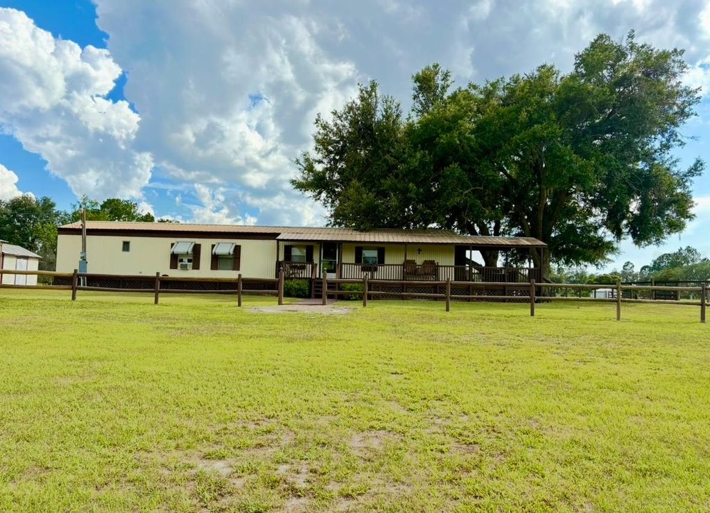 Photo of 44645 Misty Isle Drive, Deland, FL 32720 (MLS # V4943270)