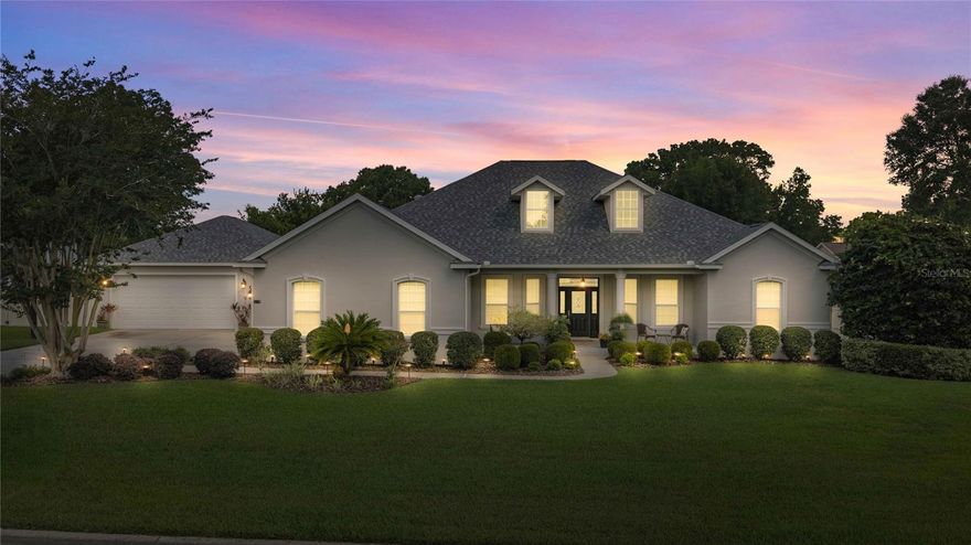 ON HALF AN ACRE & NOT IN A FLOOD ZONE! This beautifully maintained home reflects true pride of ownership and exceptional attention to detail throughout. Featuring high ceilings and a desirable tri-split bedroom floor plan, the home offers tile and engineered hardwood flooring throughout the main living areas for both style and durability. The spacious layout includes a formal dining room and an open-concept kitchen with a charming bay window overlooking the screened and covered lanai, complete with a HEATED pool and spa—perfect for relaxing or entertaining year-round. The spacious owner’s suite features an en-suite bathroom with a walk-in shower. A separate den or office is off the living area. Living area includes a cozy gas fireplace, creating the perfect flex space for working from home or unwinding.  The vinyl-fenced backyard provides both privacy and ample outdoor living space. Additional highlights include an attached 2-car garage plus a detached 2-car garage, ideal for extra storage, hobbies, recreational vehicles, or workshop space. The property also features a privacy-fenced concrete parking pad perfect for boat and trailer storage.