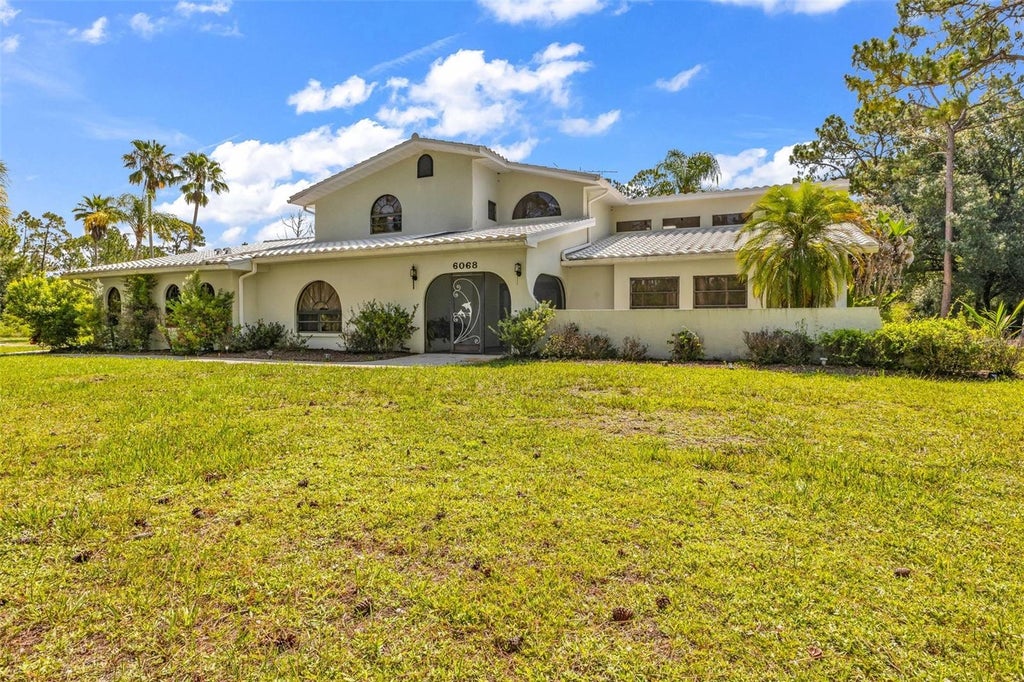 Photo of 6068 Tidwell Street, North Port, FL 34291 (MLS # C7527769)