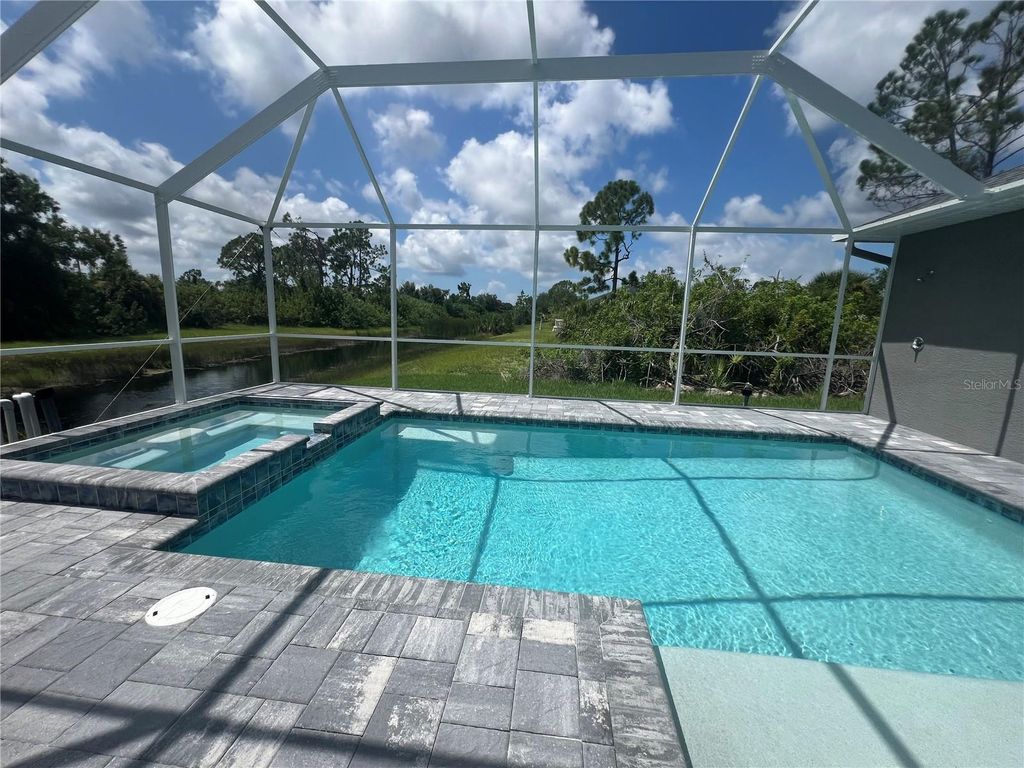 Photo of 133 Thelma Drive, Rotonda West, FL 33947 (MLS # C7524470)