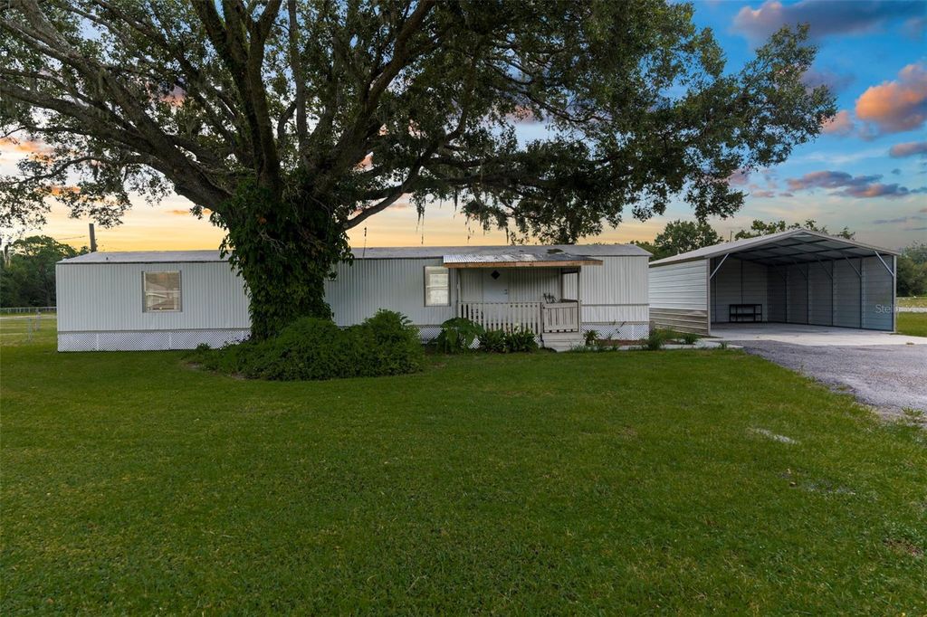 Photo of 9875 Pangola Loop, Land O Lakes, FL 34639 (MLS # TB8413471)