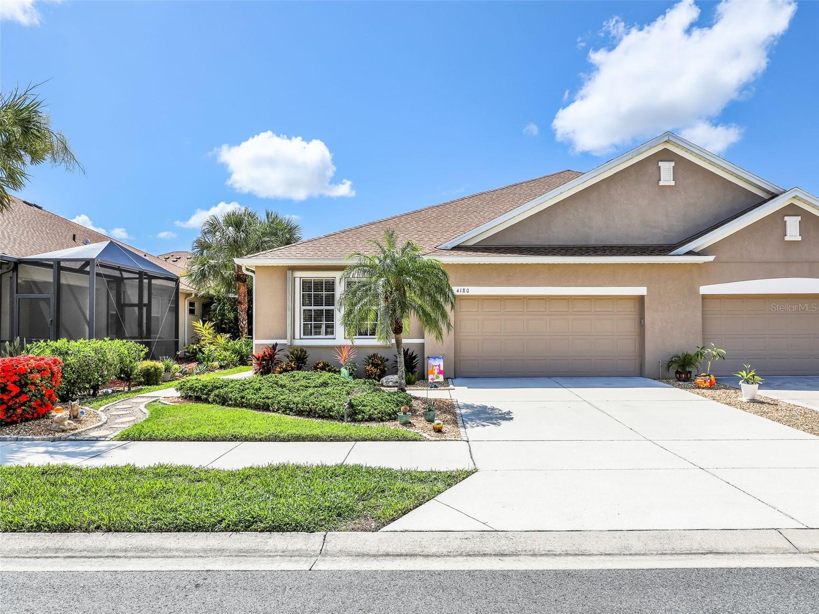 Welcome to this beautifully updated 3-bedroom, 2-bathroom villa that blends comfort, thoughtful design, and pride of ownership. Tucked away in a quiet and manicured neighborhood, this residence has been meticulously improved with a series of interior and exterior enhancements over the past few years, making it truly move-in ready. A secluded side entry welcomes you inside, where you'll immediately notice the bright, open living area complemented by neutral tones, elegant finishes, and quality materials. The kitchen, completely refreshed starting in October of 2022, features granite countertops, a deep stainless sink, and modern pendant lighting above the island bar. All major kitchen appliances, including the refrigerator, oven, microwave, and dishwasher, were ordered new just a month later, ensuring reliability and efficiency. By the end of 2022, the kitchen, main living room, entryway, and hallways were repainted, creating a fresh, clean backdrop for the interior design. In January of 2023, the main living areas were upgraded with polished porcelain tile flooring, adding a sleek and durable foundation that continues through to the second bathroom. The following month, the villa’s roof was entirely replaced, not due to storm damage but to meet HOA standards, providing peace of mind for years to come. During the same period, the kitchen cabinets were refaced, soft-close drawers were added, and new decorative hardware elevated the overall look. You'll be impressed with the better than average storage space in the primary suit and in July of 2023, the suite underwent a stunning transformation. The bedroom flooring was upgraded with laminate and both the bedroom and bathroom were painted. The master bathroom now offers a newly tiled shower with a glass enclosure, upgraded shower head and valves, granite countertops with dual sinks, a heated and backlit mirror, modern lighting, refaced cabinetry, and a new toilet—all contributing to a refined and comfortable space. The home continued to evolve into 2024, beginning with new washer and dryer units in January. The guest bathroom saw its own updates in March with fresh paint, a new shower head, faucet, and lighting. The kitchen disposal was replaced the following month, and in May, the interior doors were repainted to keep everything looking crisp and well-maintained. In July, the landscaping was enhanced with gravel and newly planted greenery, giving the outdoor space a refreshed and low-maintenance appeal. In 2025, attention was turned to even more details. A ceiling fan was installed on the back porch to keep outdoor lounging comfortable. In March, the remaining carpeted guest bedroom was upgraded with laminate flooring and repainted for continuity and style. In April, the front entry door was painted and fitted with new hardware, creating a polished first impression. Most recently, in June, the garage door opener sensors were replaced, ensuring smooth operation and added convenience. With an inviting screened lanai and a flexible floor plan offering plenty of natural light and open space, this villa is a true standout. Every improvement has been carefully selected to enhance comfort, functionality, and visual appeal. Don’t miss your chance to own a home that reflects consistent care and a commitment to quality in every corner.