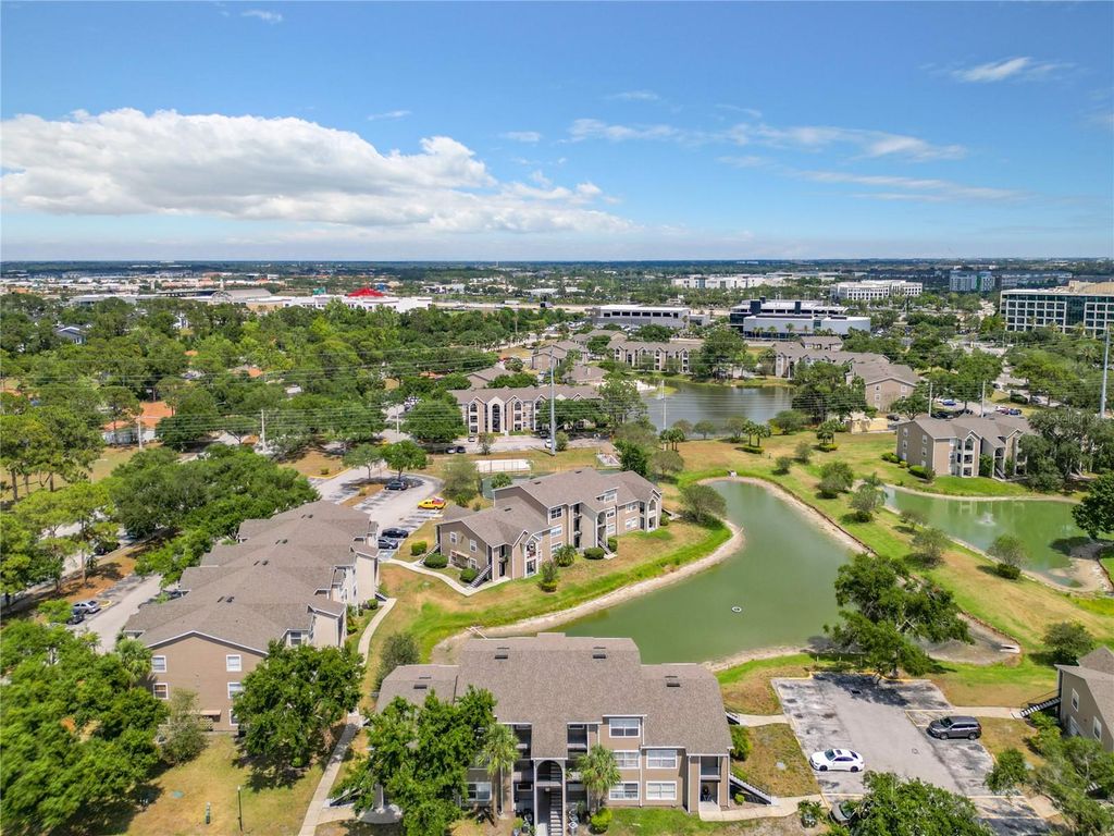 Photo of 4724 Walden Circle #1532, Orlando, FL 32811 (MLS # O6379649)