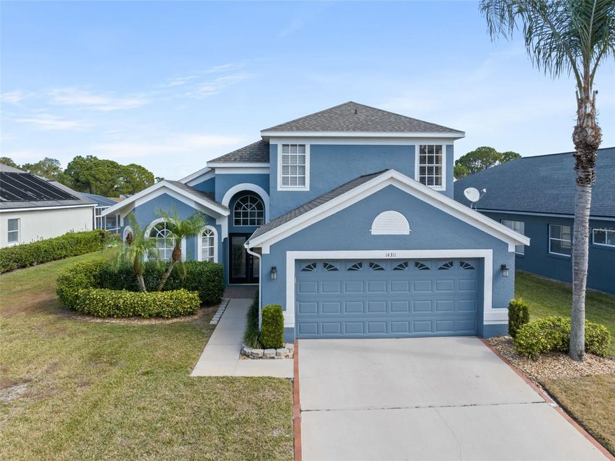 Meticulously maintained POOL HOME on a PREMIUM WATERFRONT LOT located in one of Hunters Creek’s premier gated communities with a LOW HOA – Sandhill Trace! This 4-bedroom, 2.5-bath residence, with 2143 sq ft living space and a 2 car garage, features a 2024 ROOF, a FIRST FLOOR PRIMARY ENSUITE and a thoughtfully designed semi-open floorplan with a separate living room and dining area, a half bath downstairs, and a spacious great room that seamlessly connects to the kitchen with a dining nook. Volume ceilings and abundant natural light enhance the inviting interior. Take in the gorgeous view of the pool and the water as you walk into the home and enjoy easy access to your outdoor oasis from the family room, the dining nook, and the primary bedroom. 

The kitchen showcases timeless appeal with beautiful wood cabinetry, granite countertops and stainless steel appliances. Upstairs, a versatile loft provides the ideal space for a home office, playroom, or lounge. Three additional generously sized bedrooms offer comfort and flexibility for family and guests.  

The private outdoor space is an entertainer’s dream with a covered lanai and a screened-in pool overlooking the picturesque pond—your own peaceful retreat. 

Situated just minutes from The Loop Shopping Center and a wide array of shopping, dining, and entertainment options, this community offers a lifestyle of connection and recreation with top-rated schools, walking trails, tennis courts, dog parks, playgrounds, and year-round resident events. 

Come experience the perfect balance of beauty, privacy, and community right here in Hunters Creek! 

**This house comes with a REDUCED RATE through the seller's preferred lender. This is a lender-paid rate buydown that reduces the buyer's interest rate and monthly payment.**
