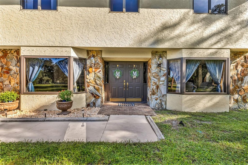 Photo of 24518 Tangerine Avenue, Port Charlotte, FL 33980 (MLS # C7531343)
