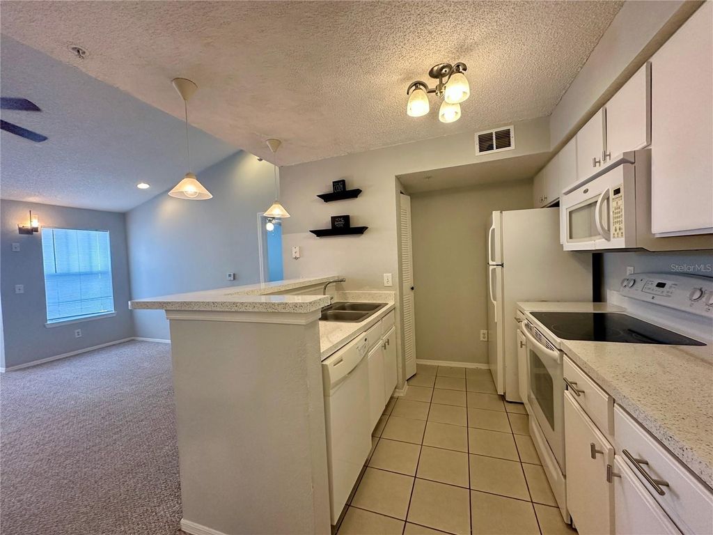 Photo of 2212 Grand Cayman Court #1633, Kissimmee, FL 34741 (MLS # O6398174)