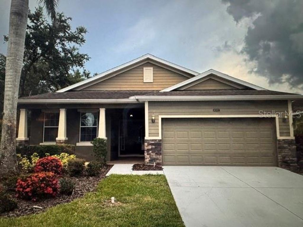 Photo of 8302 Karpeal Drive, Sarasota, FL 34238 (MLS # A4692209)