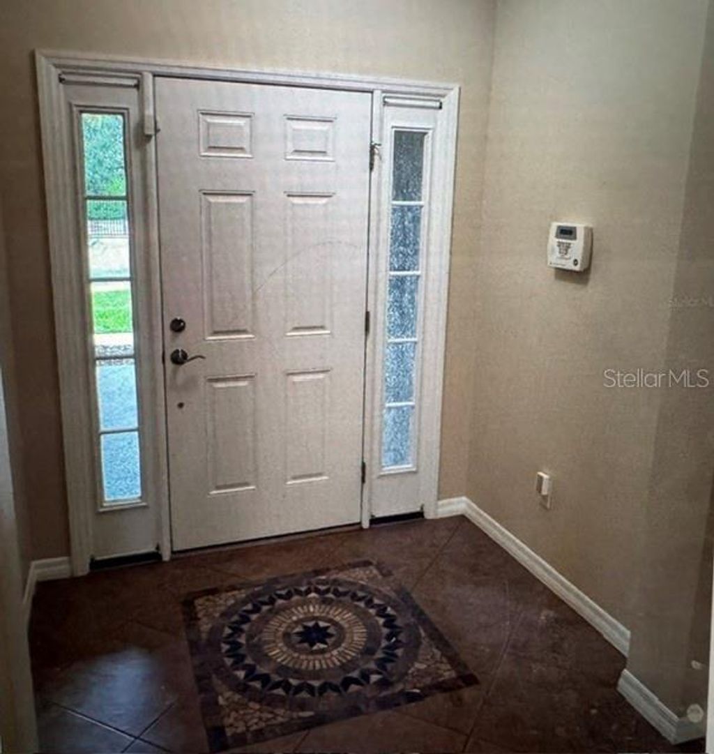 Photo of 8302 Karpeal Drive, Sarasota, FL 34238 (MLS # A4692209)