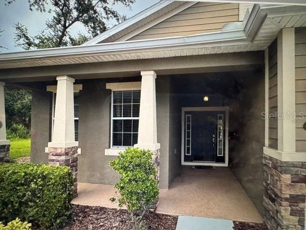 Photo of 8302 Karpeal Drive, Sarasota, FL 34238 (MLS # A4692209)