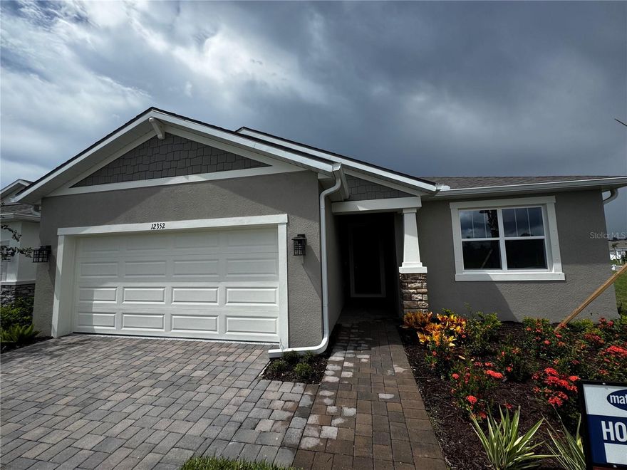 Welcome to The Gateway, an elegant Craftsman-style single-family home nestled in the upscale gated Windwater community of Parrish, FL. This brand-new residence offers a thoughtful and modern living experience with 4 bedrooms, 3 bathrooms of 2,209 sq?ft of Living Space. Gourmet Kitchen Equipped with all included appliances, featuring 42? Barnett Painted Harbor cabinets and luxurious Carrara Breve quartz countertops. Expansive Master Suite Retreat-style master bedroom with a glamorous ensuite bathroom including dual-sink raised vanity, glass-enclosed shower, and generous closet space. Convenient laundry room fully equipped with washer and dryer. Enjoy access to community pool, playground, park, walking sidewalks, and gated security. HOA includes maintenance and recreational facilities.