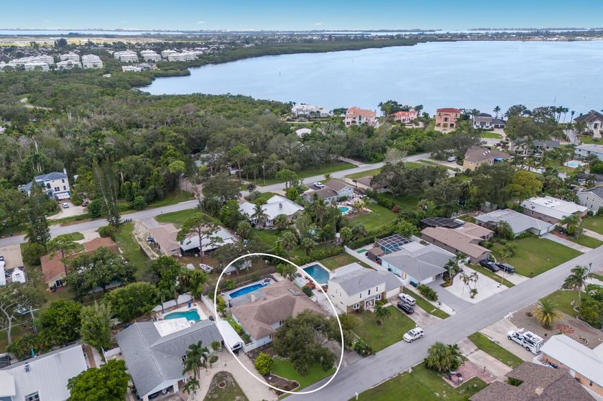 BACK ON MARKET! No fault of the seller and no inspection report received. This is your second chance to own this beautiful home after the previous buyer had a change of heart -  Don't miss out twice!  Welcome to your NW Bradenton oasis, a true gem offering the best of Florida living. This stunning 5-bedroom, 3-bathroom updated home is perfectly situated just five miles from the pristine beaches of Anna Maria Island, placing you at the heart of coastal paradise. Tucked away in a peaceful neighborhood right off of Palma Sola Bay, this property is centrally located for ultimate convenience, with easy access to shopping, dining, and entertainment. This is a fantastic opportunity for both a luxurious full-time residence and a savvy rental investment, as it is not in a flood zone and has a proven track record with a total rental income of over $80,000. The home can be sold fully or turnkey furnished (brand new furnishings), providing a seamless transition. With over $100K in updates, the home has been transformed with new lighting and fans, a completely refreshed primary and hall bathroom, and a full interior and exterior paint job, and so much more – see attached improvements list.   Step into your private backyard retreat featuring a brand-new, screened-in lanai surrounding a heated, saltwater pool and spa. The incredible landscaping creates a lush, tropical setting with multiple fruit trees and a new drainage system, perfect for entertaining or relaxing. For those seeking a permanent residence, the home is zoned for an excellent school district, making it a perfect choice for families. It has been meticulously updated with a new AC just installed and a new pool pump in 2025, ensuring that major systems are in top condition for years to come. Investor alert – over 30K in upcoming rental income!  This is a rare opportunity to own a piece of paradise in a prime location.