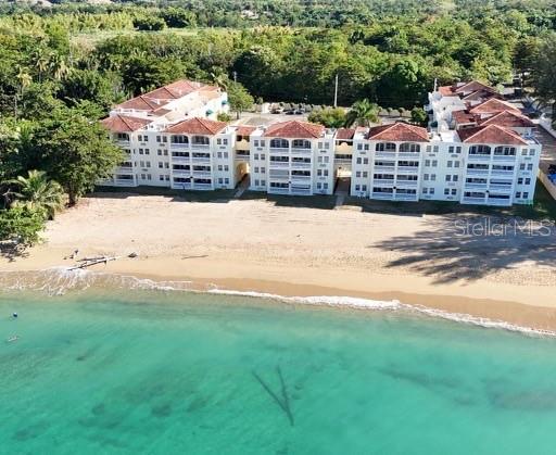 This cozy, fully furnished apartment offers an unforgettable experience with its stunning roof terrace and direct beach access. Located in the heart of Rincón, this apartment is a paradise for those who appreciate the beauty of nature and sunsets. The exclusive roof terrace offers panoramic, partial views of the ocean, providing the perfect setting to unwind and witness the most beautiful sunsets in Puerto Rico. Furthermore, the property provides direct access to the beach, allowing you to enjoy the crystal-clear waters and sandy shores at your convenience. The apartment comes fully furnished and equipped with everything you need for a comfortable stay, ensuring a hassle-free and relaxing experience. Whether you are looking for a peaceful retreat or an adventurous beach getaway, this apartment in Rincón caters to all preferences. Don't miss the opportunity to immerse yourself in the beauty and tranquility of this charming location.