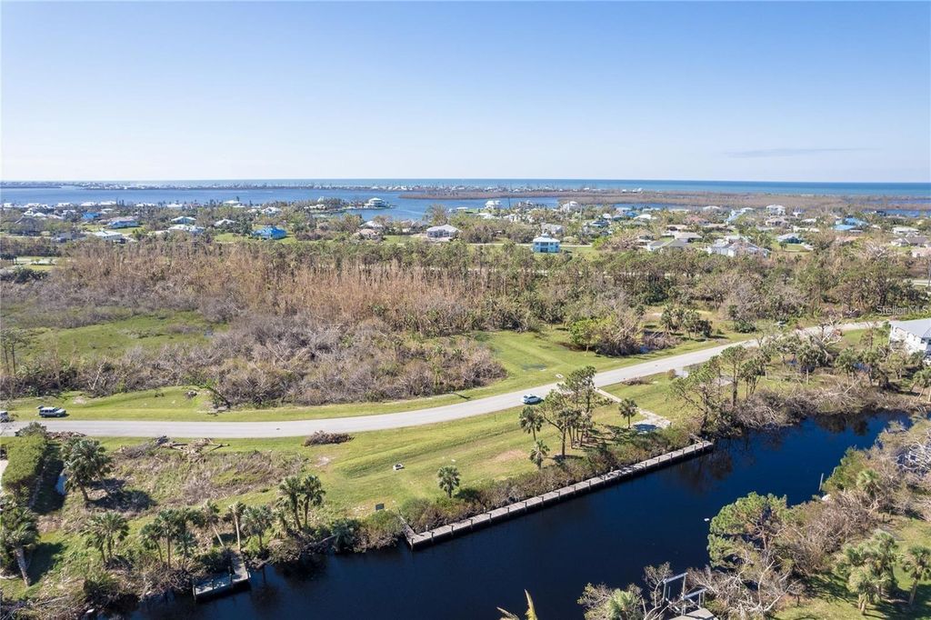 Photo of 10121 Creekside Drive, Placida, FL 33946 (MLS # A4677707)