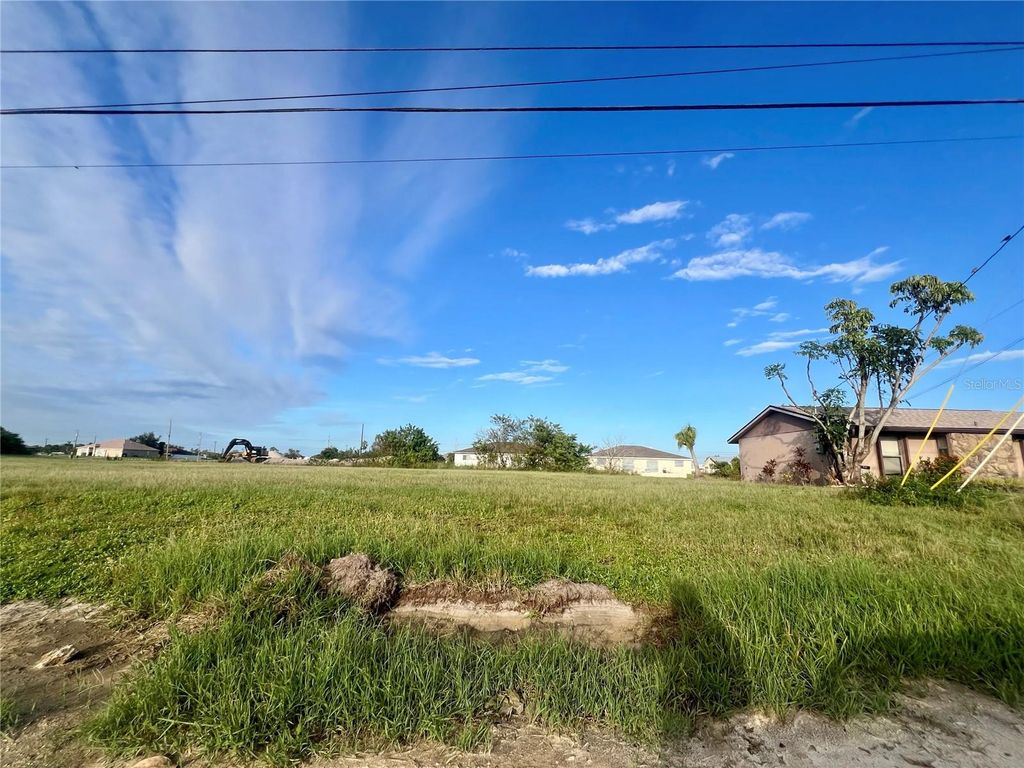 Photo of 1424 NE 9th Avenue, Cape Coral, FL 33909 (MLS # C7510408)