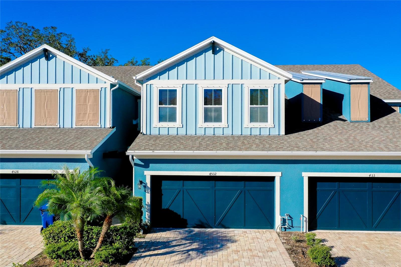 One or more photo(s) has been virtually staged. Short Sale. Rarely Available!! This maintenance free cozy community of only 35 Townhomes is nestled away in a private gated community and surrounded by nature. This two-story home features 2025 Roof, an open concept living area with rear screened porch overlooking the trees, 3BR, 2.5 bathrooms and 2 car garage. NOT required to pay flood insurance. The master suite on the second floor offers a screened balcony overlooking the beautiful nature and trees, the 2 guest bedrooms and loft area are also located upstairs. Interior finishes include tile flooring, quartz countertops in the kitchen with glass tile backsplash, tons of cabinets, pantry, Eat-in kitchen, stainless-steel appliances, minimum water use plumbing fixtures in the bathrooms, recently updated master bathroom, whole house water softener as well as an individual sink upgraded water softener offering double the filtering!! Minutes to shopping, dining, UTC Mall, Nathan Benderson Park and easy access to downtown Sarasota, Beaches and I-75. Opportunity for a VA Assumable Loan. Owner is NOT required to pay flood insurance. No damage was incurred by any of the hurricanes or storms.