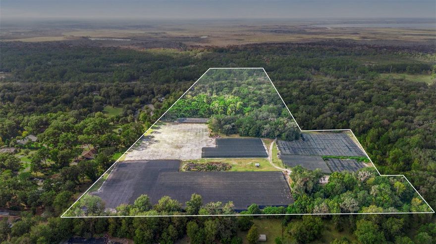 Nestled in the heart of Glenwood, Florida, this expansive 53.65-acre property is currently utilized as a thriving fernery, showcasing its agricultural potential. With expansive, well-maintained fields and convenient access to local amenities such as Downtown Deland, Sun Rail/amtrack station, St John's River and an easy drive to the beaches, this land is ideal for agricultural ventures, private estate development, or future expansion. It is one of the few large parcels of land left in this area.  It’s a versatile property that blends functionality with opportunity, making it a rare find in the vibrant Glenwood area. Sale includes 2 parcels, King St at 18.7 acres and No Name St at 34.95 acres.