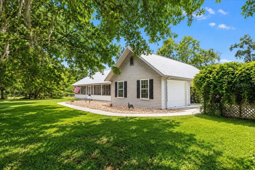 Photo of 25419 NW 105th Place, High Springs, FL 32643 (MLS # GC541260)