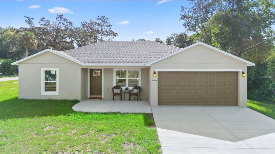 One or more photo(s) has been virtually staged. **ALSO LISTED FOR SALE  $345,000  MLS# V494265  SELLER OFFERING OWNER-FINANCING & PREFERRED LENDER OFFERING 4.99 FHA LOAN!** | BRAND-NEW 2025 dream home WITH NO HOA! Perfectly situated on an OVERSIZED CORNER LOT (*just under 1/4 acre*) in the heart of quiet & charming Historic Orange City, FL— this 3-bed, 2-bath, 2 car garage home offers sturdy BLOCK construction, LOW ENERGY windows, STAINLESS STEEL appliances, GRANITE countertops including soft-close cabinetry, and an open layout ideal for modern living. Enjoy the privacy of a SPLIT FLOOR PLAN, along with the convenience of an INDOOR LAUNDRY room & thoughtful details throughout— such as hidden linen closets & electrical outlets on the kitchen island. Conveniently located giving you quick access to 17-92 and I-4, placing you just a short drive from our East Coast beaches or the excitement of Orlando. (Currently staged & DOES NOT come furnished. On septic (no sewer charge.) On City Water (tenant will have a water bill.) Use RentSpree to apply:  https://apply.link/0kRrCW4