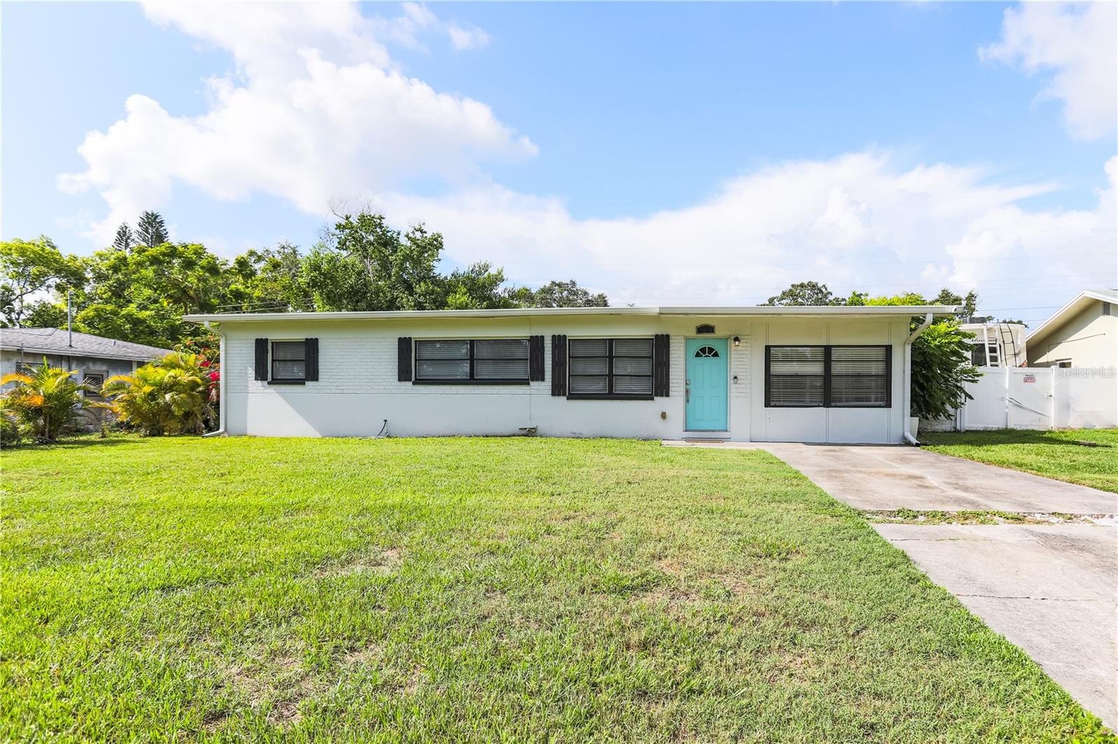 Welcome to Your Personal Florida Oasis!
This beautifully maintained 4-bedroom, 2-bath home is move-in ready and offers the perfect combination of comfort, functionality, and freedom—no HOA! With an open-concept design and zero carpet throughout, it’s built for effortless living and entertaining.
The kitchen is a standout for any home chef, featuring custom cabinetry, granite countertops, and stainless steel appliances, all seamlessly connecting to the dining space for easy gatherings. The private primary suite includes dual closets and an ensuite bath, offering a peaceful retreat at the end of the day.
Step outside to your very own backyard paradise—a sparkling inground pool awaits for those warm Florida days, and the covered side lanai is ideal for outdoor dining or simply lounging in the shade. The generously sized, fenced-in yard has plenty of room for play, pets, or a garden—and it’s just waiting for your firepit to complete the cozy evening vibe.
Major updates include a newer A/C (2020) and roof (2021) for added peace of mind. Located just minutes from downtown St. Pete, Tampa, Dunedin, and Florida’s famous Gulf Coast beaches, this home is perfect as a primary residence or a short-term rental investment.
With a long driveway for ample guest parking, this property checks all the boxes. Don’t wait—your Florida dream home is here. Schedule your private showing today!