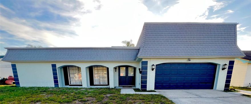 Beautiful Pool Home in Beacon Square !! Just Reduced by $14,900, Come and See!! Lovely setting on a spring-fed lake. Enjoy the spectacular sunsets and cool evening breezes off the lake as you sit in the bug-free zone of your caged pool yard. This unique home is one of the largest in the neighborhood, at over 1500+ square feet. Excellent floorplan with split bedrooms and lots of living space laid out with a separate living room, dining room, and family room. A very possibilities for a third bedroom, This is a rare pool home that's also got a beautiful water view just beyond and also boasts a two-car garage. House has been completely remodeled, kitchen, 2 bathrooms ,new flooring throughout  and updating as well as resurfacing of the pool,  the roof was just replaced as well as the electrical panel newer  This is on the water-side of 19 and just a short trip up the road to Gulf Harbors beach Club, Green key beach. or Robert K Rees Memorial Park. Many restaurants and stores on 19 within a short distance. Wonderful primary or secondary home in a quiet neighborhood. Just Painted inside and out!! New flooring !! MOVE IN READY!! CALL TODAY!!